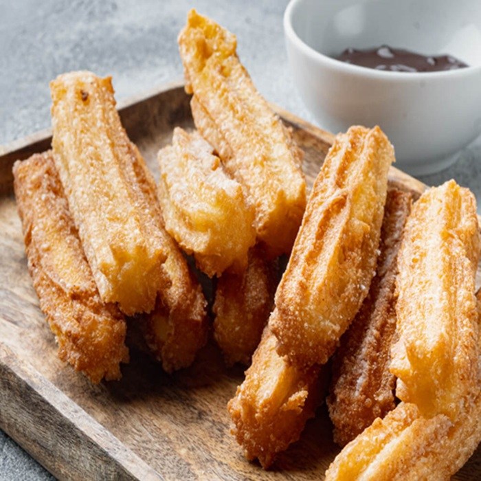 Churros caseros y chocolate espeso